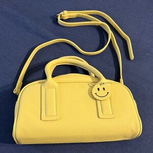 Yellow Handbag with Smiley Charm